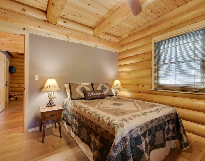 Cozy bedroom in log home