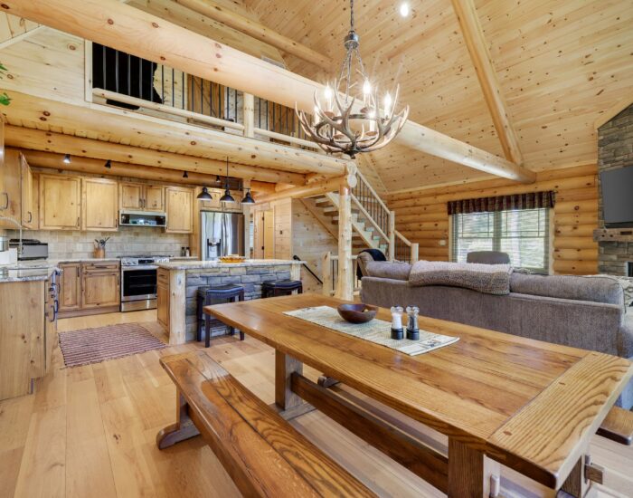 Log home interior with antler chandelier