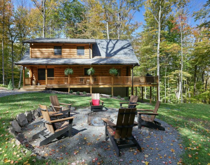 Log home with outdoor firepit